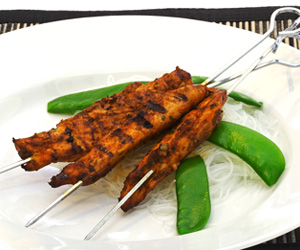 Photo of Chicken Kebabs, snow peas and rice noodles