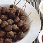 Photo of meatballs on a white plate